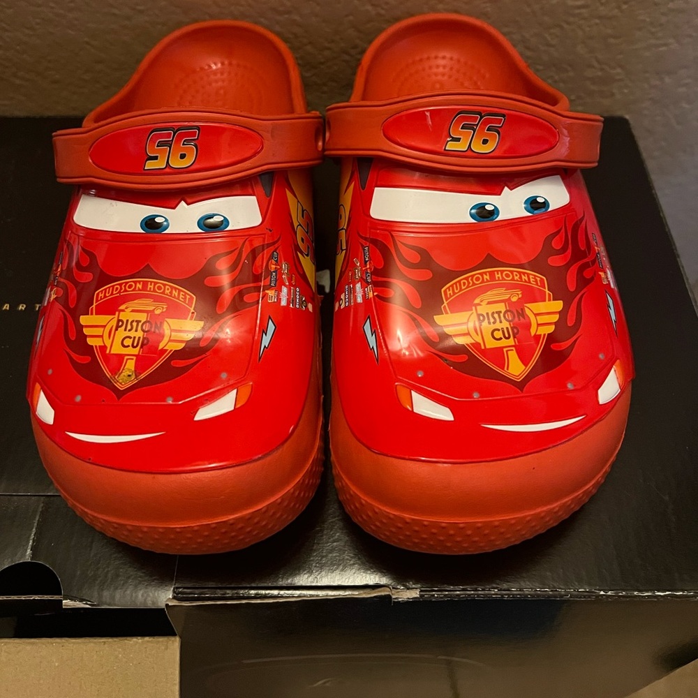Kids size 3 Lightning McQueen crocs, new.